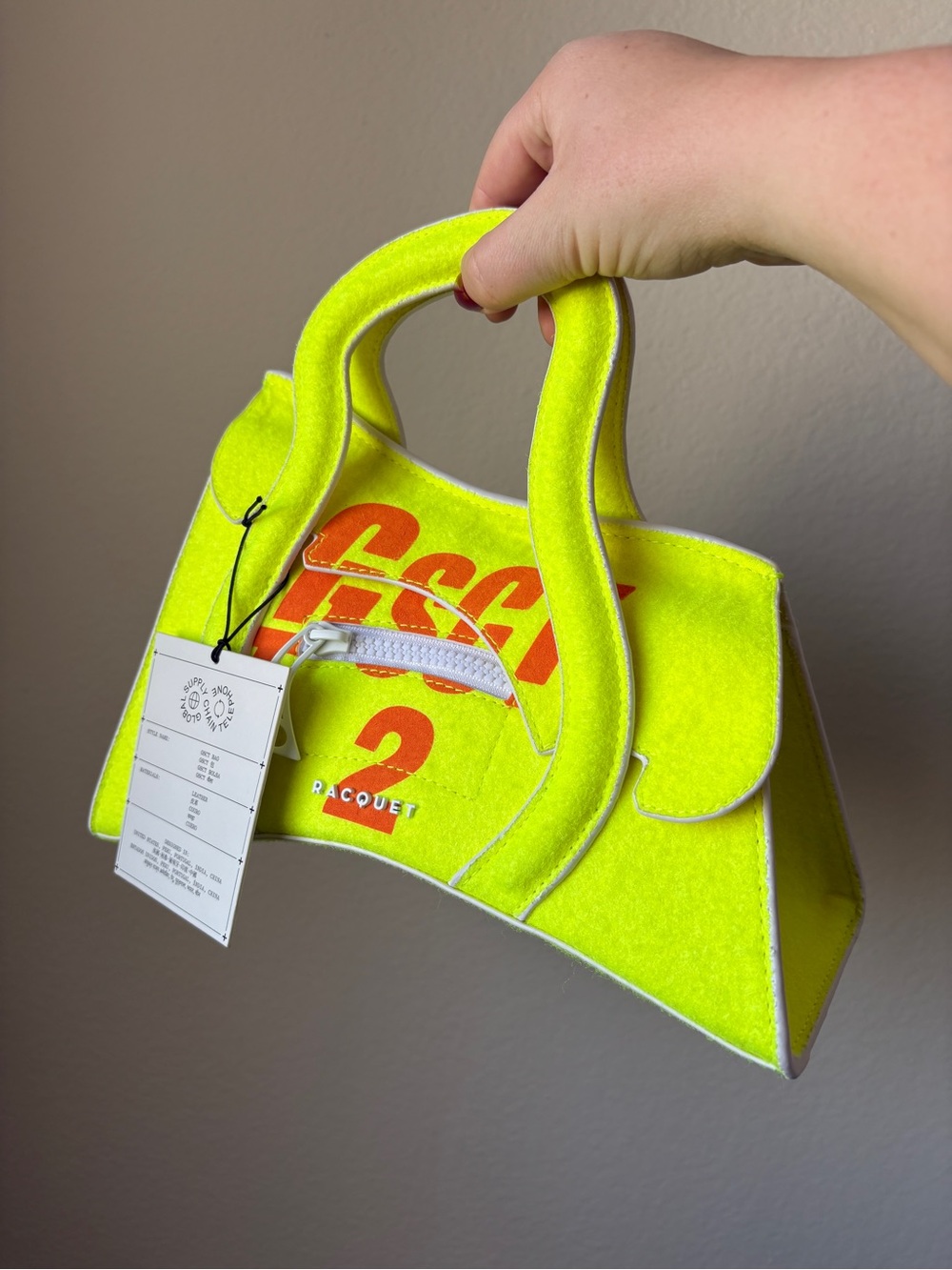 MSCHF, limited-edition Global Supply Chain Telephone Bag, tennis ball, NWT